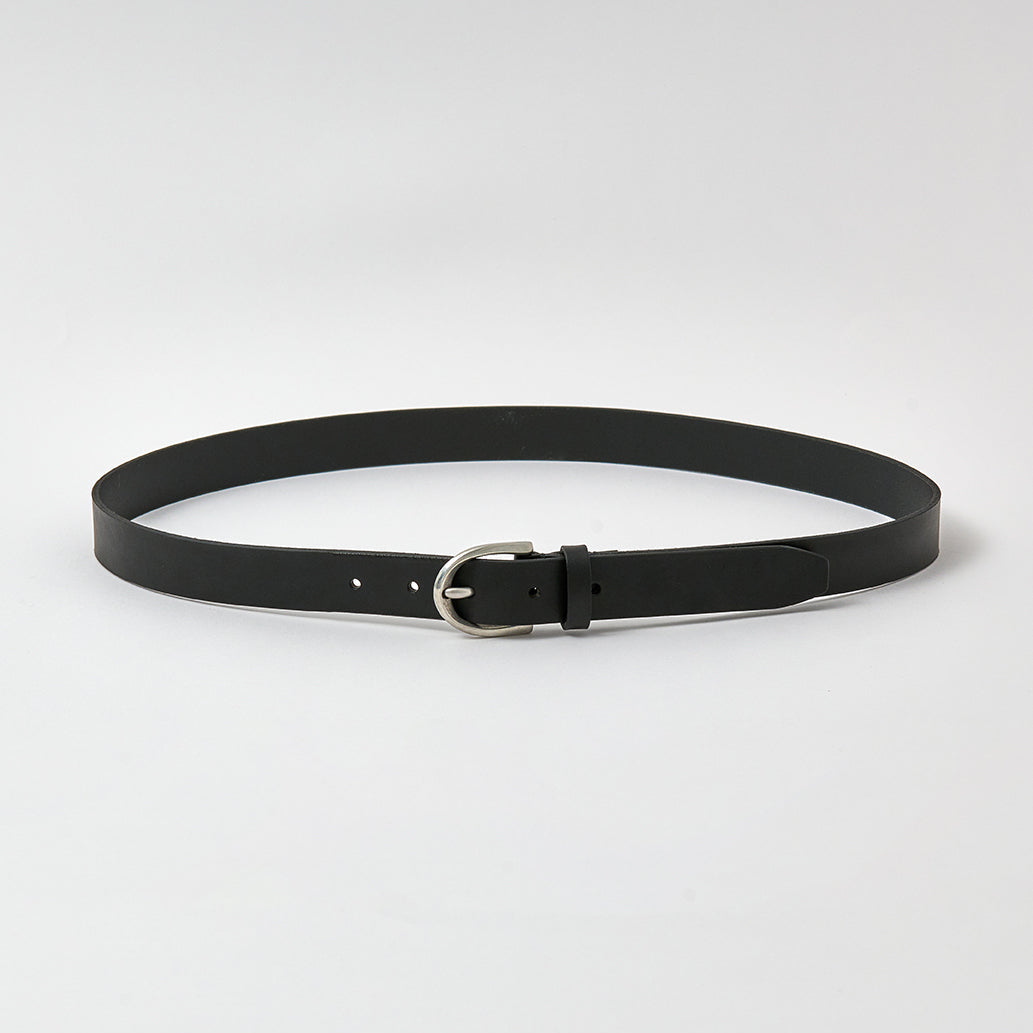 Black belt with a silver buckle on a light gray background