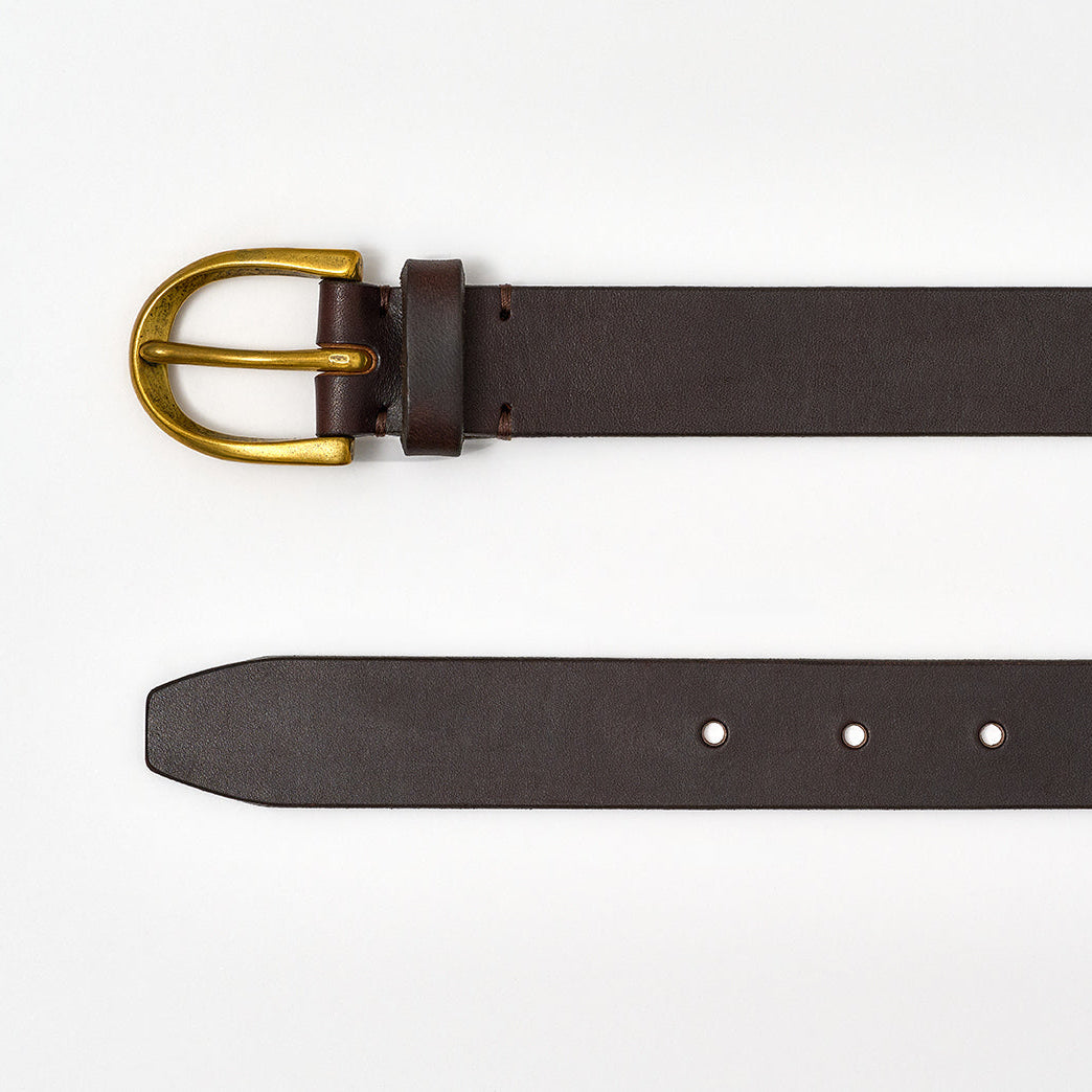 Brown leather belt with a gold buckle on a white background