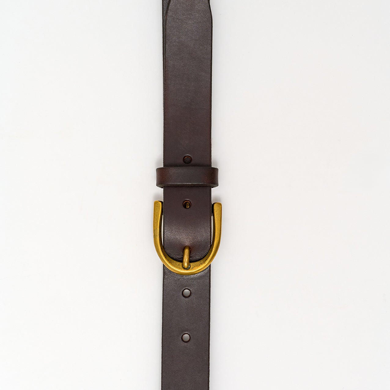 Brown leather belt with a gold buckle on a white background