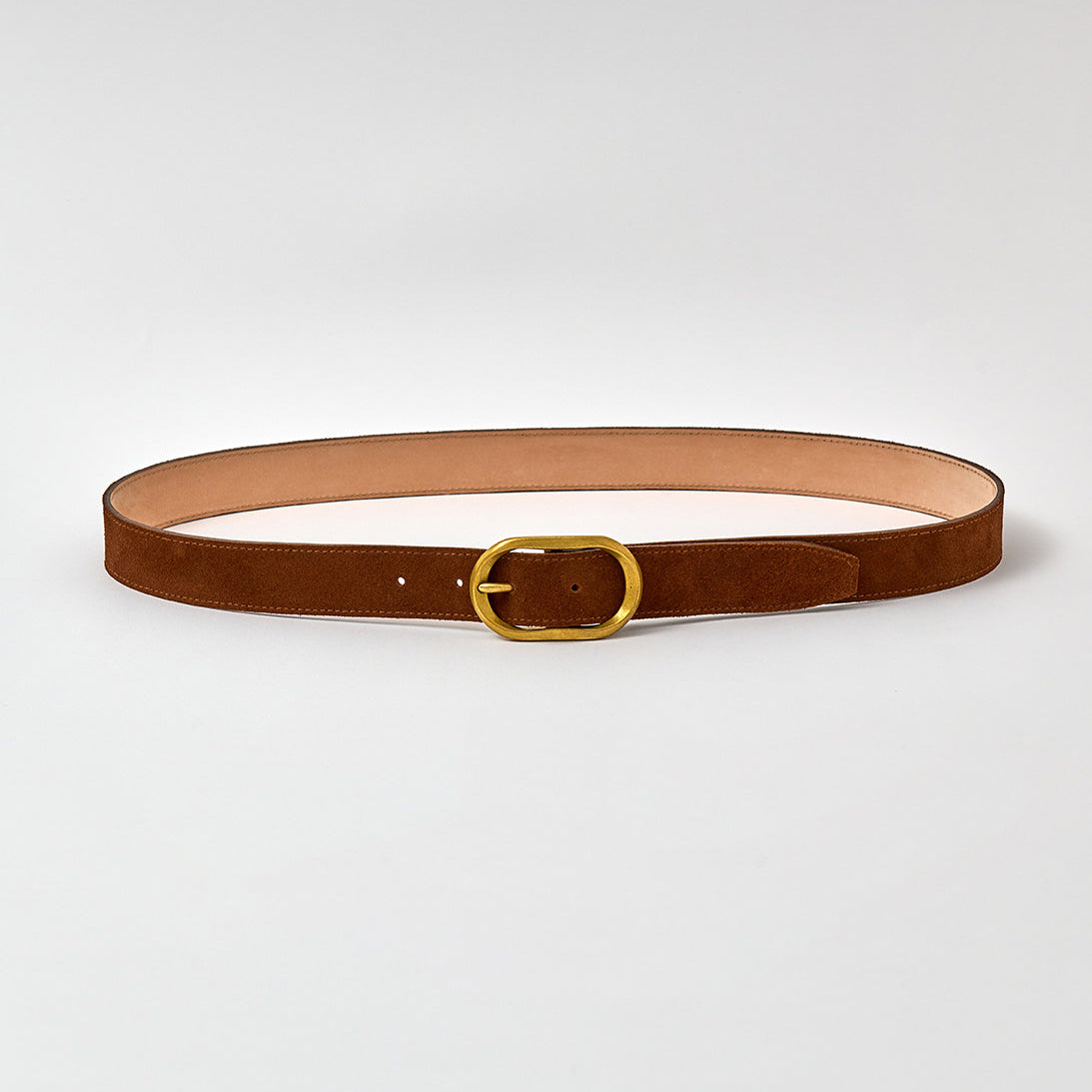 Brown belt with a gold buckle on a light gray background