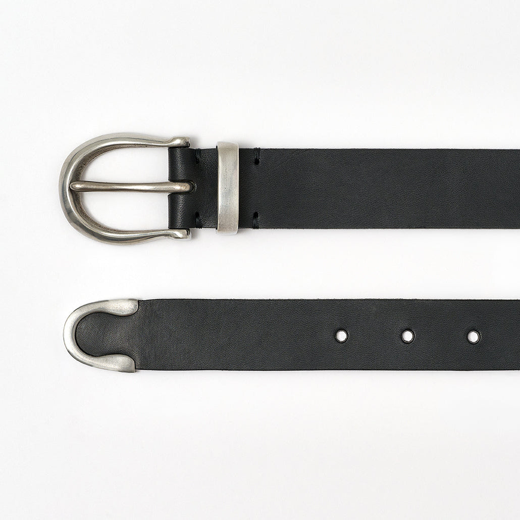 Black leather belt with silver buckle on a white background