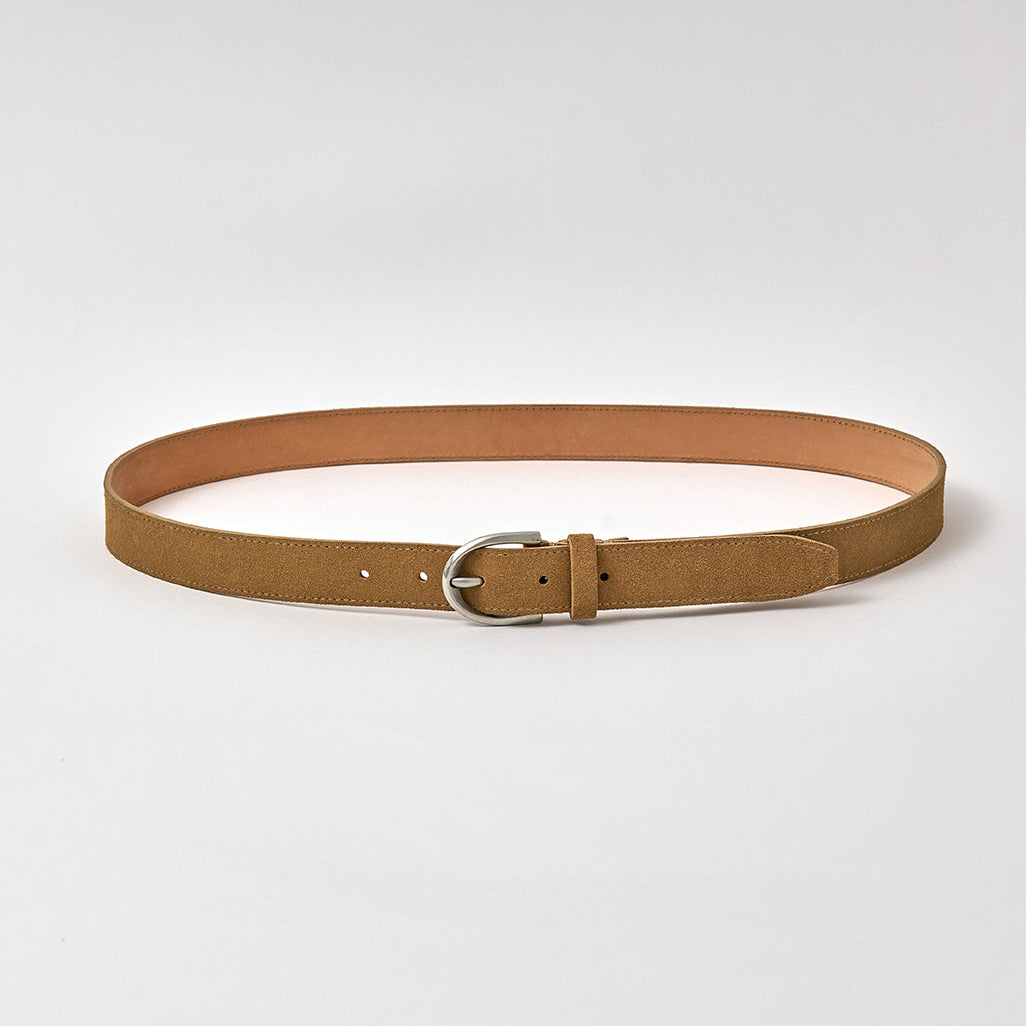 Tan belt with a silver buckle on a light gray background