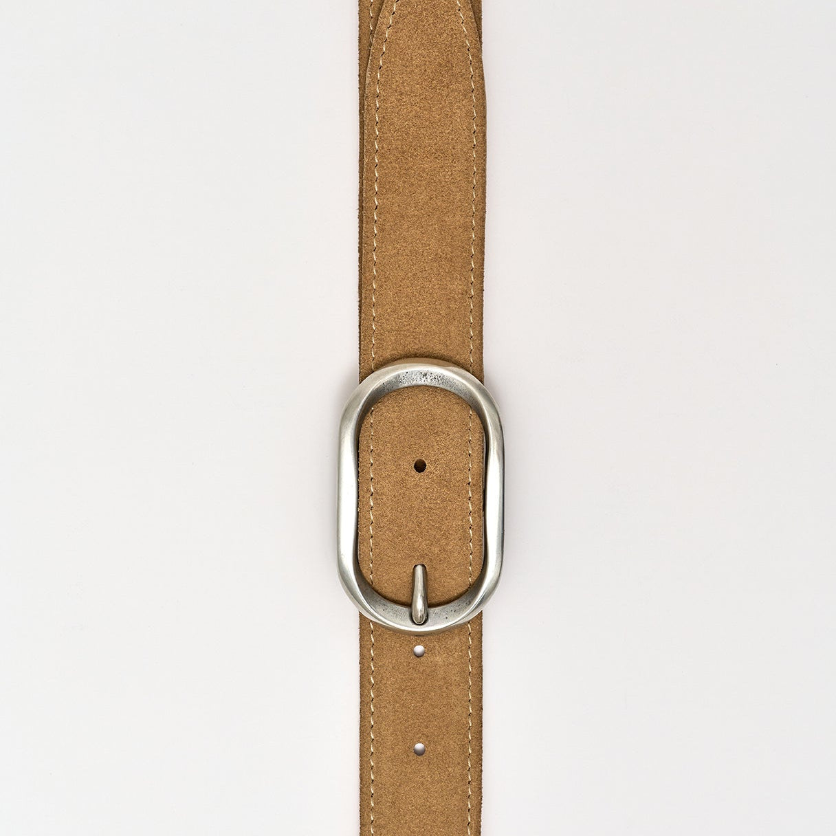 Brown leather belt with a silver buckle on a white background